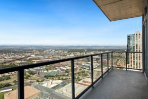 Bright living room in month-to-month rentals in Denver with modern decor.